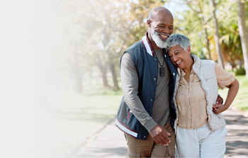 Couple wearing micro device, walking