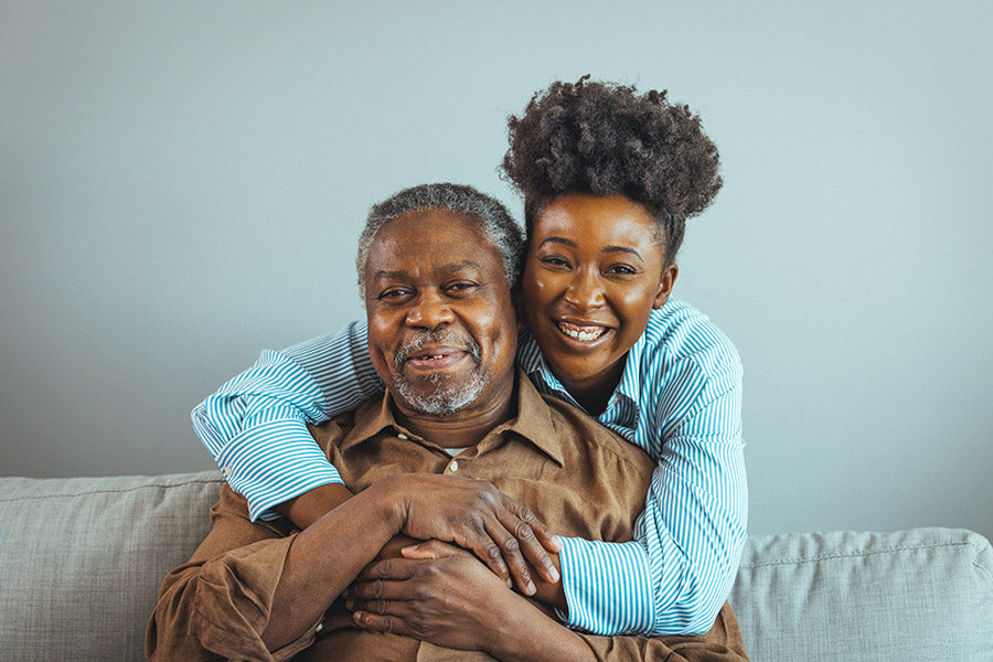 Caregiver daughter with her elderly father.