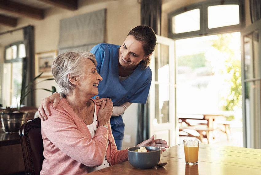 Senior woman living at home with full-time in-home care.