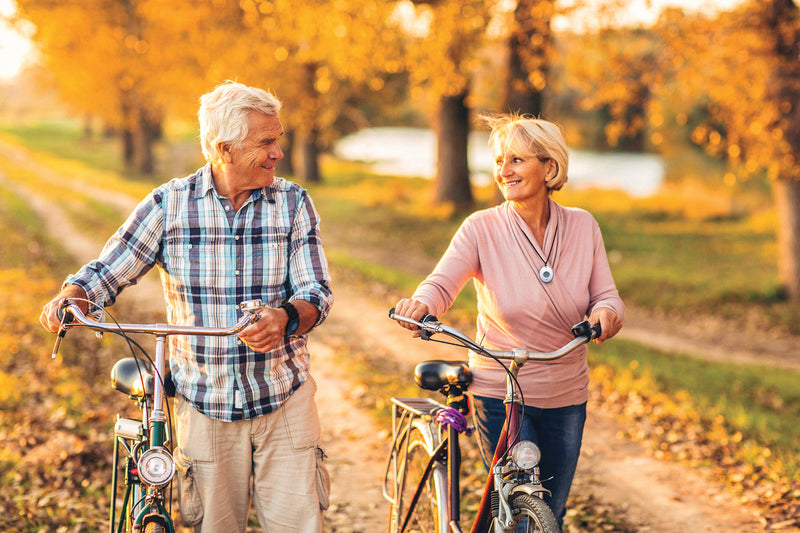 Senior couple biking