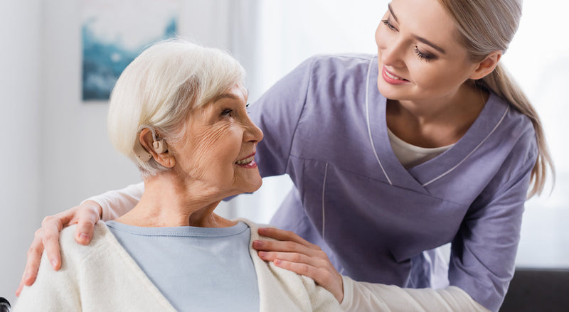 Senior lady with hearing aid